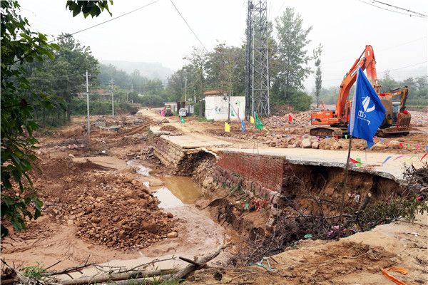 1630287031385305XfQb.jpg 洪灾损毁路段2.jpg